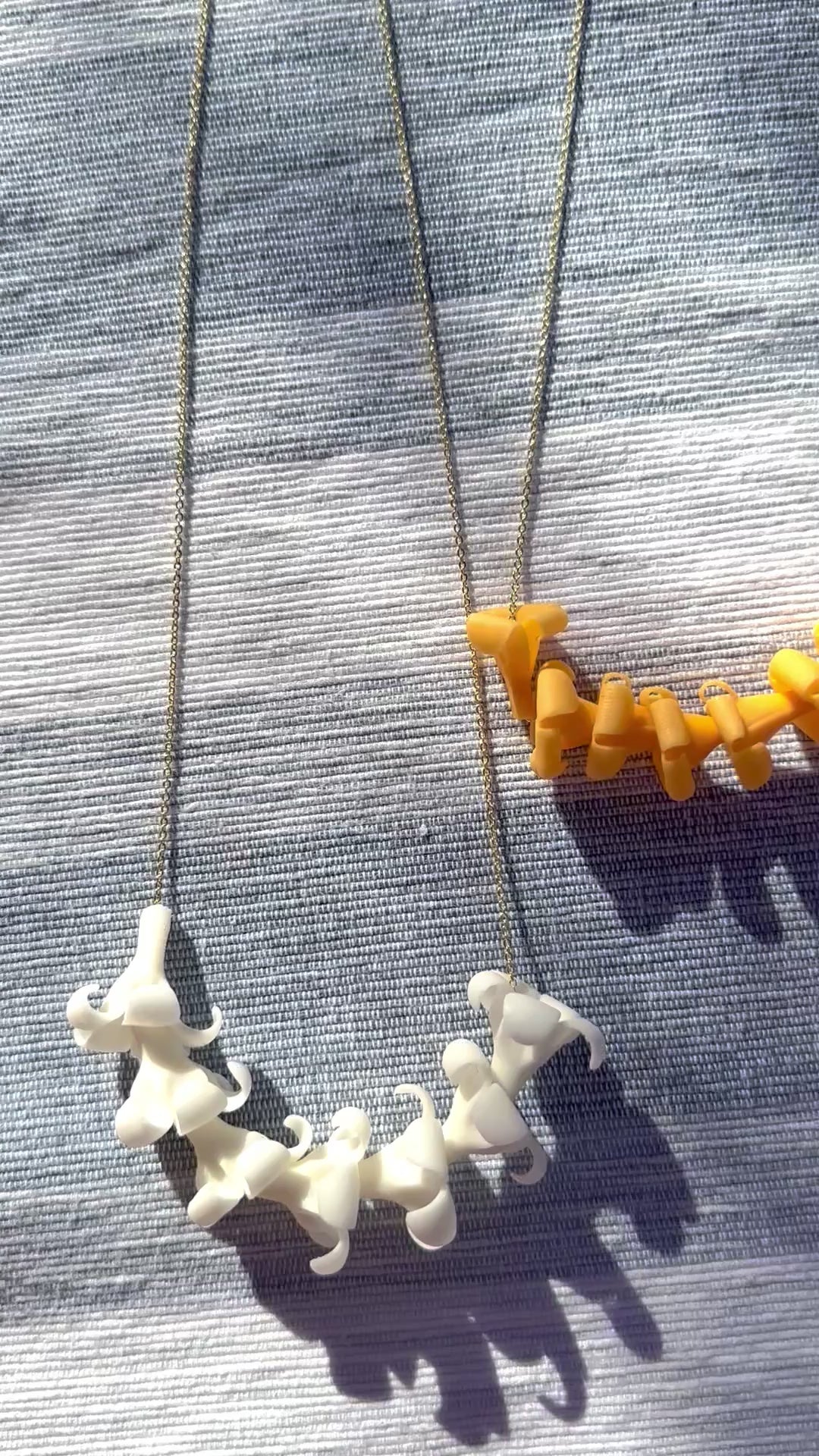 Load video: Puakenikeni Necklaces