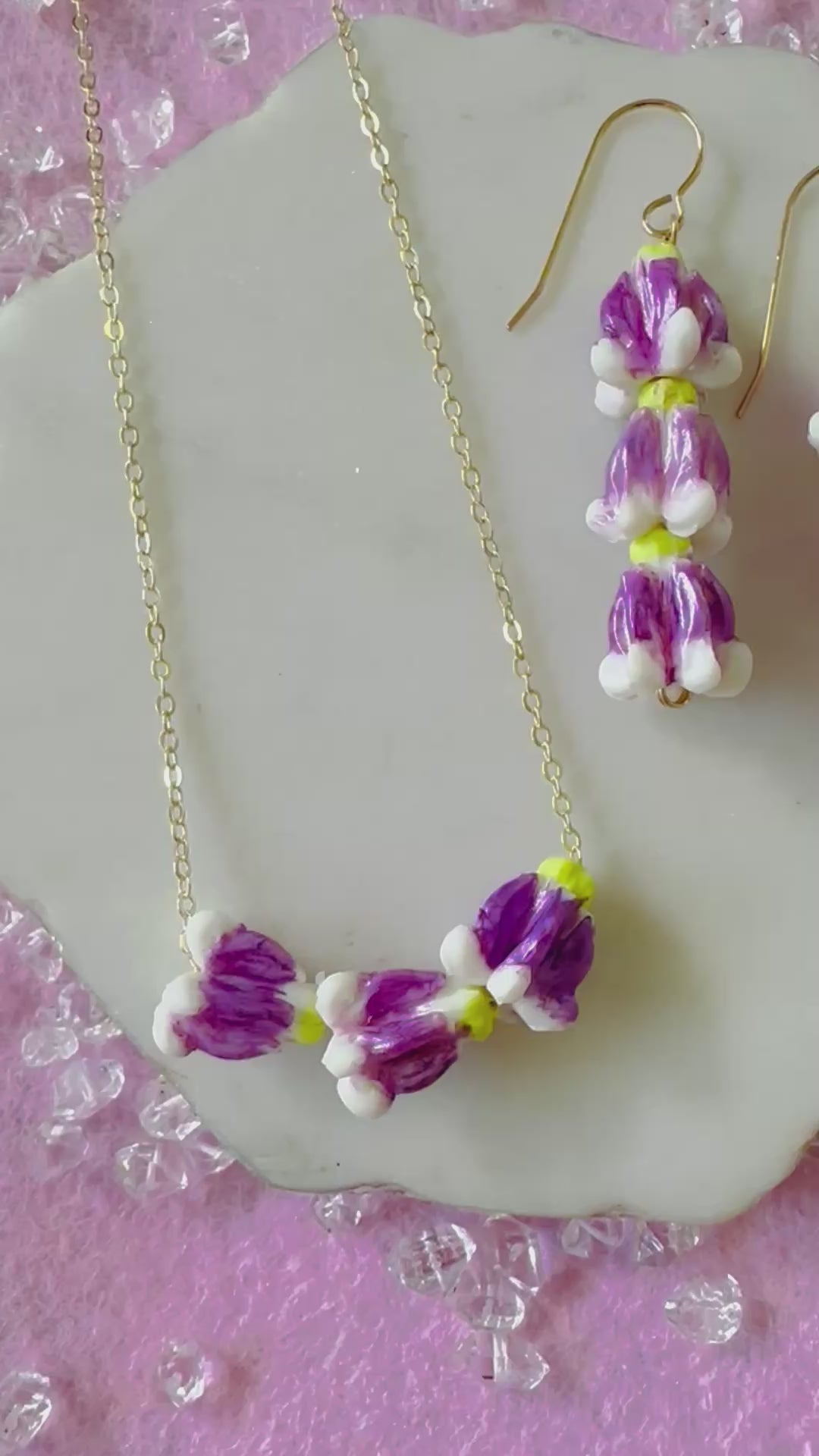 Load video: Shinny Purple Crown Flower Necklace