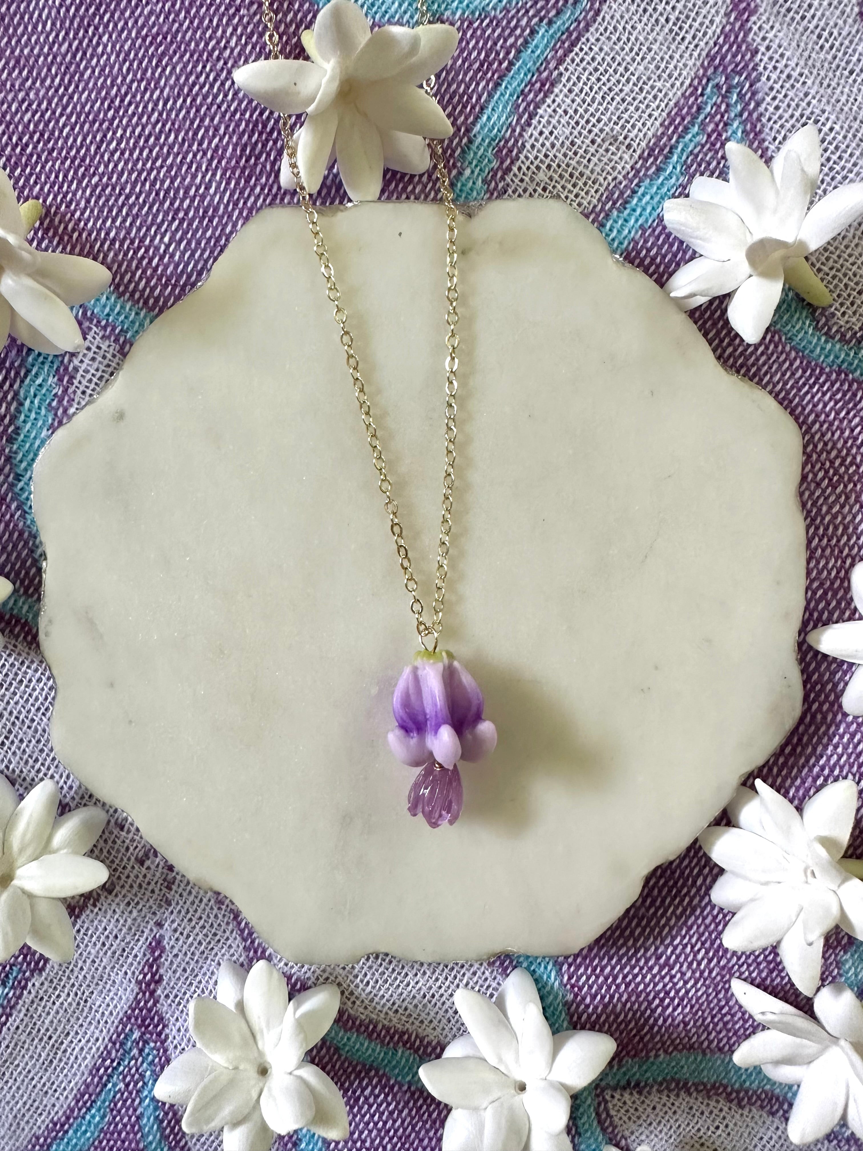 Purple Clear Pikake & Crown Flower Necklaces