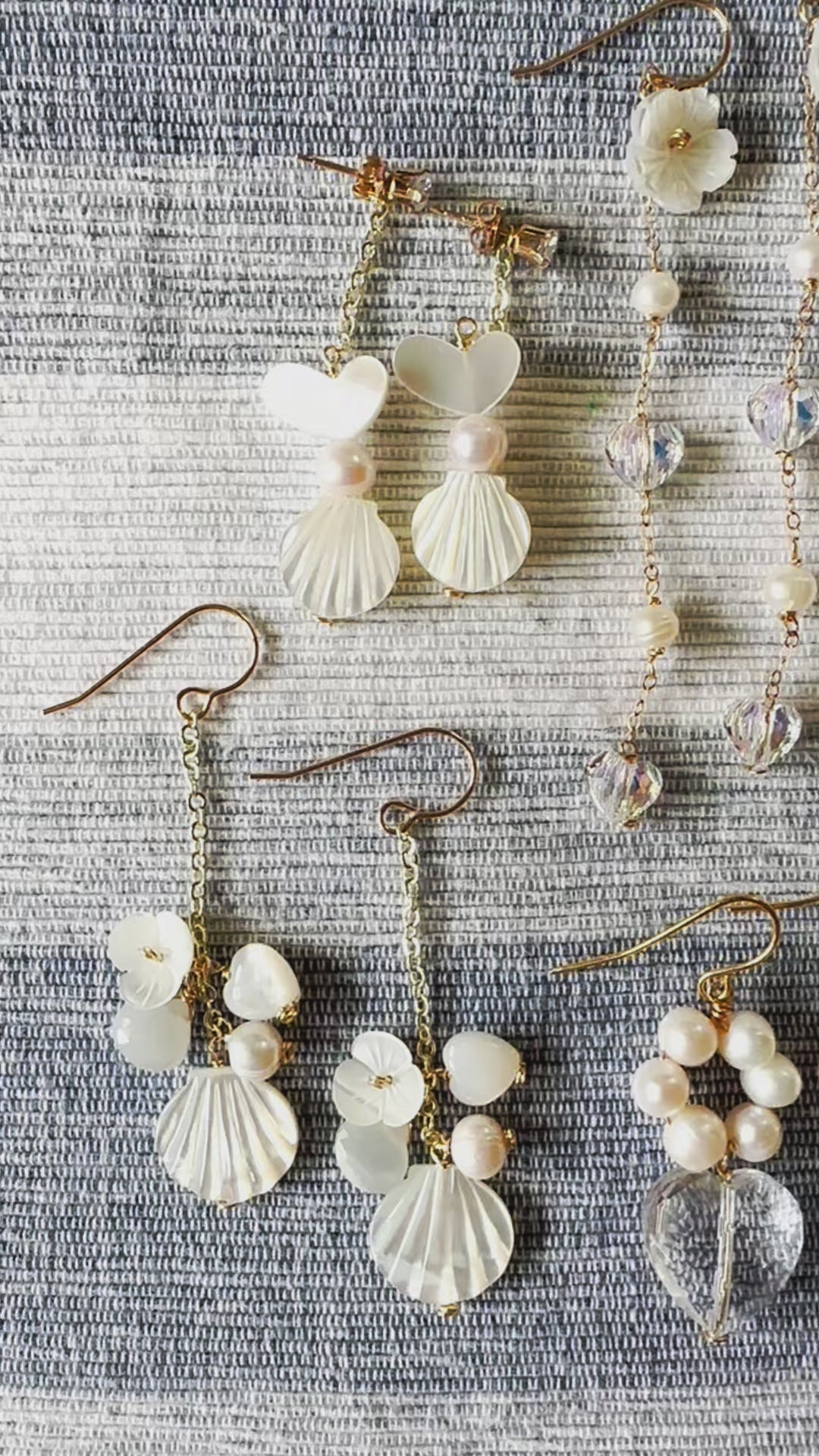 Load video: White Heart Shell Stud Earrings