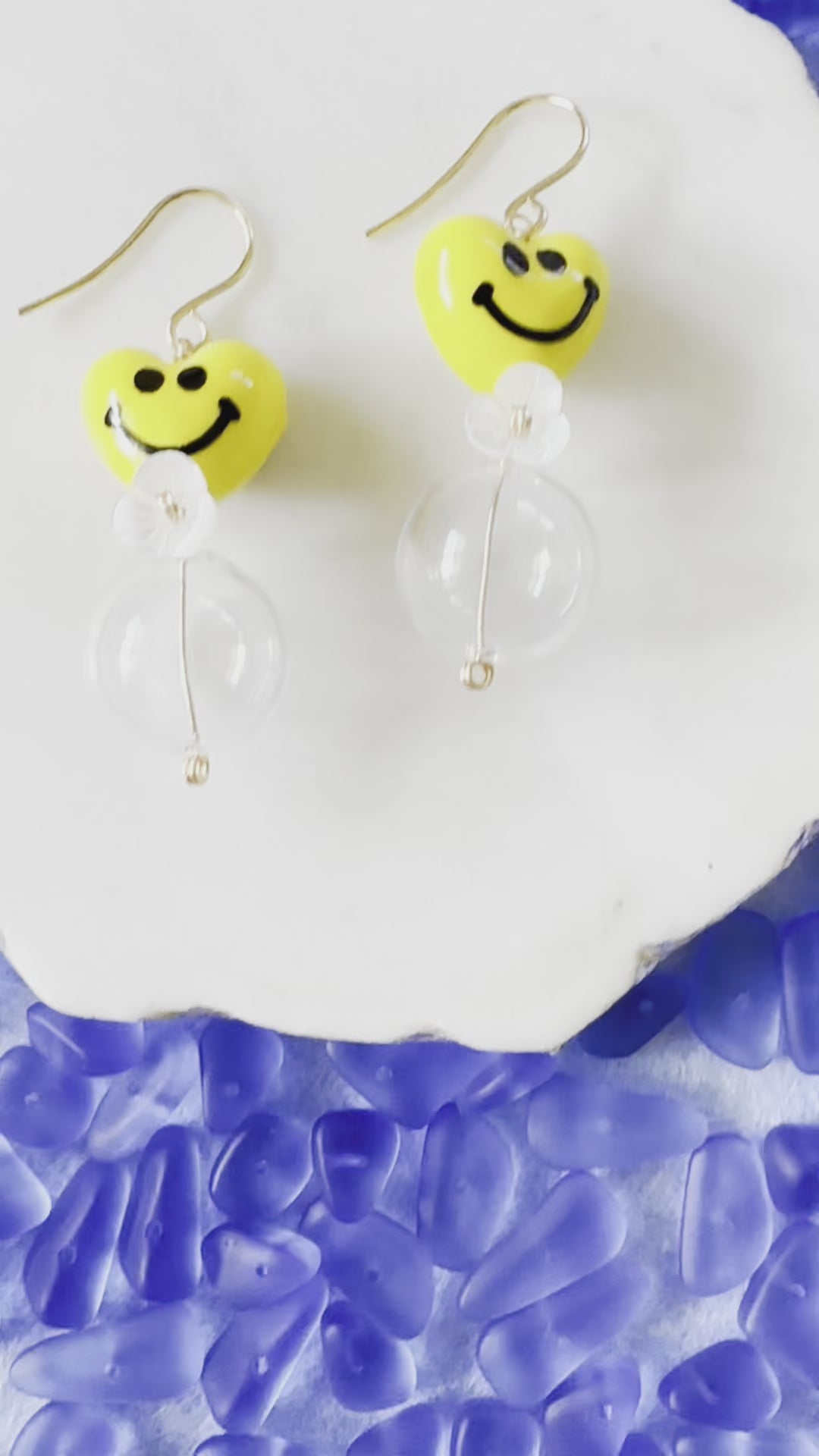 Load video: Happy Face &amp; Clear Glass Earrings