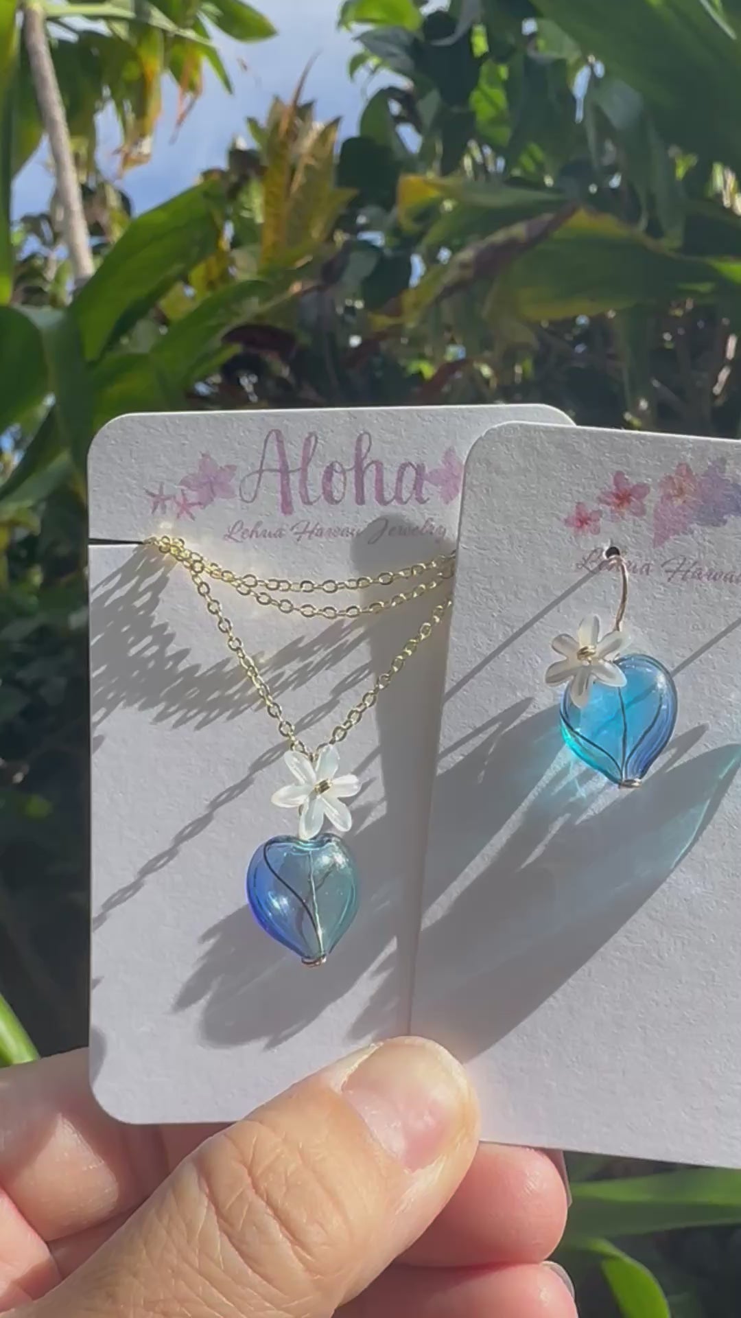 Load video: Shell Tiare &amp; Blue Puff Heart Glass Earrings