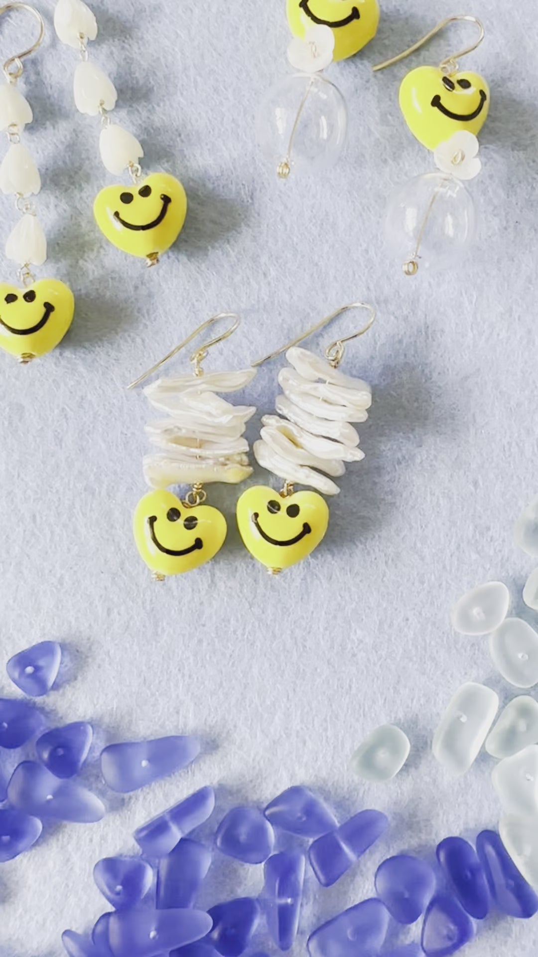 Load video: Happy Face &amp; Clear Glass Earrings