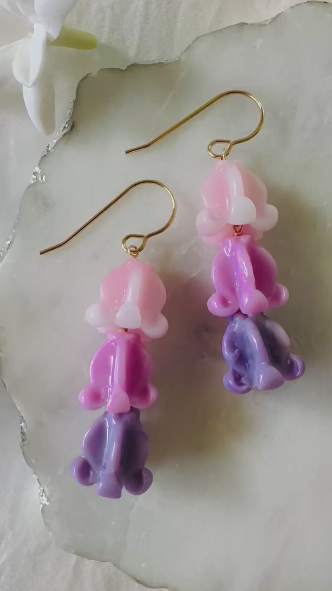Load video: Triple Crown Flower Earrings