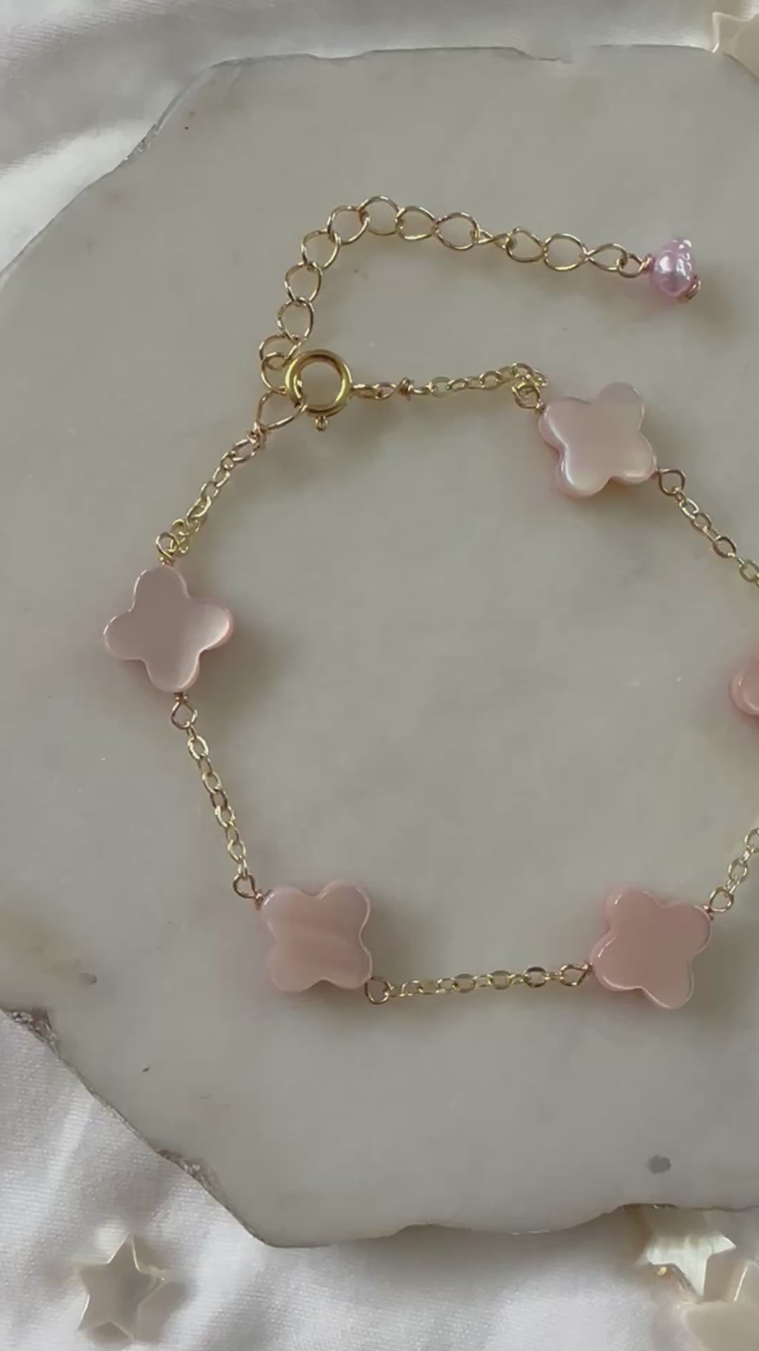 Load video: Pink Clover Shell Bracelets